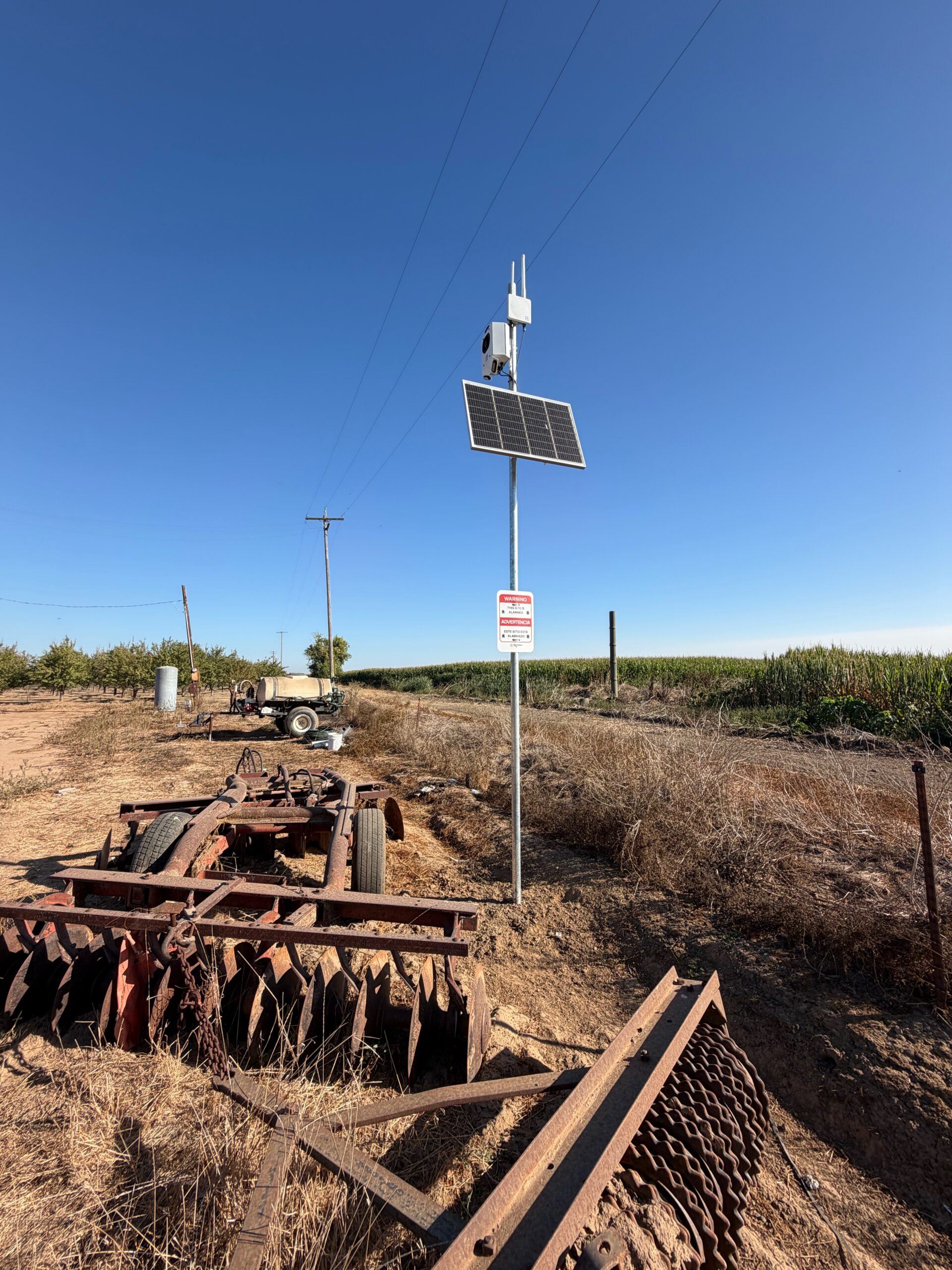 Farm security system protecting remote irrigation equipment from copper theft